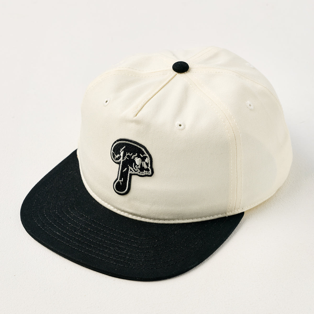 PHILLIES SAD SKULL PATCH HAT - VINTAGE WHITE AND BLACK